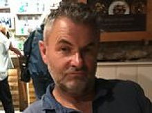 Teacher, 56, left paralysed from the chest down after 'vicious' boyfriend pinned her onto bed and snapped her neck, court hears