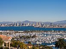 Greedy woman stole $9m from employer and treated herself to coastal mansion with Porsche on the driveway