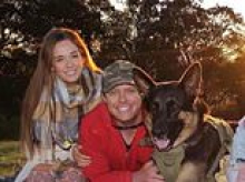 Arnie the German shepherd: Bombshell twist after beloved family dog was found dead in a ute 10 days after it was reported stolen - as his OWNER is arrested