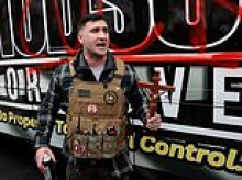 Far-right protester tries to BURN Quran in America's most Muslim city as calls to bring ICE in sparks outrage