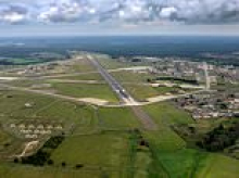 Police chopper was forced to take 'emergency evasive action' after being targeted by UFO over US air base last year, unearthed report reveals