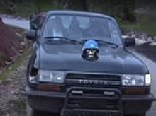 Serbian leader denies involvement in Sarajevo 'human safari' sniper trips as macabre picture emerges showing skull in a helmet 'on car used by militia boss'