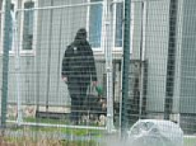 Security ramps up in town awaiting arrival of 600 lone male asylum seekers as residents are told they'll only get '48 hours' notice' before migrants move onto army base