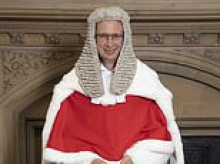 Woman accuses family courts of 'state-sanctioned abuse' after six-year-old daughter was ordered to keep the surname of father who raped her mother