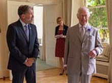 Married CEO who welcomed the King on royal visit quits alongside female executive after 'being caught on camera in compromising situation in front of staff'