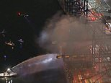 Firefighters battling massive blaze on LA cargo ship rocked by huge explosion