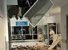Most powerful cyclone to hit Darwin in 50 years wreaks havoc: Hospital roof collapses, roads are closed and police issue warning to locals