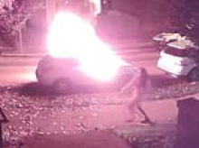 Gang of teenagers set car on fire on leafy street before fleeing in new 'ding dong ditch prank'