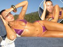 Dua Lipa puts on an eye-popping display in a tiny sequin bikini as she poses up a storm on the beach in Brazil