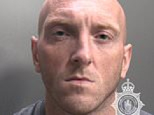 Hellraiser biker who dodged three police stingers then performed celebratory wheelie - after earlier hitting 118mph - is jailed for 21 months