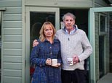 Royal Mail worker is forced to tear down wooden summer house in their back garden after neighbour reported 'unauthorised construction' to Labour-led council