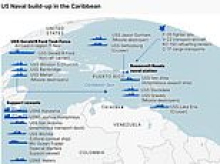 World waits to see if Trump will attack Venezuela: President's top military adviser heads to region where US has gathered huge fleet of warships as pressure on Maduro to quit grows