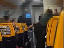 Female MMA fighter, 39, 'is arrested after two Spanish police officers were attacked following disturbance on Ryanair flight'