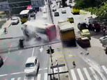 Moment lorry with no brakes ploughs into 12 vehicles at busy intersection