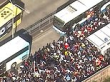 One dead as wild weather rips through NSW - with storms adding to heatwave conditions and causing public transport chaos on the T1 western line