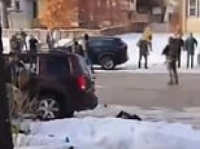 Wife of Minneapolis woman, 37, shot dead by ICE for driving at agents screams 'That's my wife, I have a six-year-old at school' seconds after her death