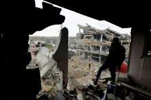 V izraelskem napadu v Gazi ubitih 13 ljudi