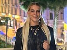 Owners of the Swiss bar in which 40 people burned to death in a New Year's fire say waitress they viewed as 'a stepdaughter' suffocated 'in a pile of bodies behind a locked door'