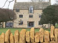 'Self-centred' millionaire at war with neighbours in sleepy Cotswolds village over plans for a 'monstrous' luxury pool house at his £3.4m mansion