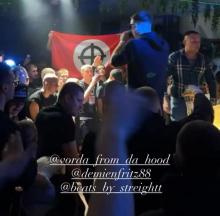 Policija na podlagi medijskih poročanj preiskuje nacistične simbole na glasbenem nastopu