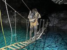 Thrill seeker is airlifted to hospital after falling onto rocks when zip line snapped in old slate mine