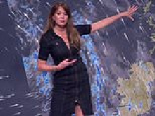 There's life after Carol Kirkwood: BBC weather presenter Lizzie Rizzini sparks frenzy over 'racy' outfit on Six O'Clock News