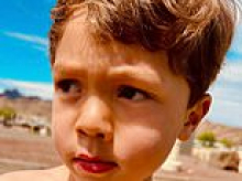 Woman scowls throughout court appearance as she denies hit-and-run death of boy, six, who was riding his bike