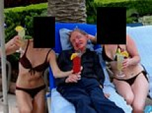 Professor Stephen Hawking's family reveal truth behind photo of him sandwiched between bikini-clad women that appeared in Epstein files