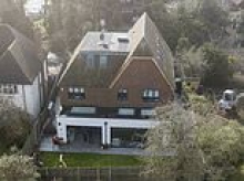 Mother at war with neighbours over plans to build 'ugly' five-bed newbuild home next to her £2.5m Victorian mansion