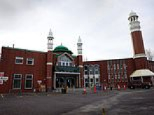 Second suspect is arrested after 'man armed with axe' walked into Manchester mosque