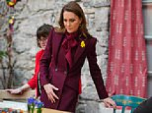 Burgundy beauty! Kate drenches herself in head to toe red as she joins Prince William in Wales ahead of St David's Day