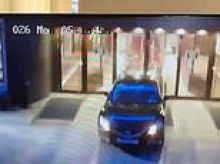 Brit tourist completely trashes hotel entrance by reversing his Mazda through two sets of glass doors at Polish ski resort