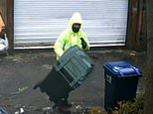 Lazy DC garbage collector filmed hurling trash cans down alley instead of emptying them