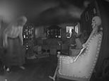 Eerie moment house with skeleton sitting on chair EXPLODES filling its rooms with black smoke as it burned down