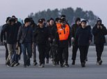 How many of Tehran's feared Revolutionary Guard will be sneaking into the UK on small boats? asks SUE REID