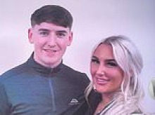 Hitman in jail for gangland execution poses with his girlfriend in a snap taken by a PRISON GUARD