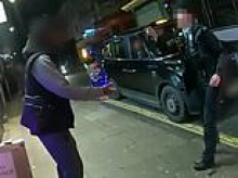 Moment two brave female police officers confront man brandishing a knife - shoving him into shopfront to take blade off the streets