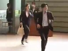 Moment Japanese minister sprints into meeting because she is five minutes late - and then apologises to the whole country