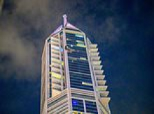 Iran launches night drone attack on Dubai: One man killed and two skyscrapers in flames hours after city's airport was struck