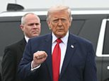 President Trump looks solemn as he lands at Delaware air base to welcome home six American soldiers killed in the Iran war