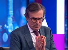 'The absolute state of Robert Peston!' Viewers' shock at 65-year-old broadcaster's garish red £145 Nike trainers and 'knuckle duster' rings while covering Middle East conflict