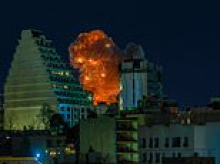 Flames engulf Iran after devastating US and Israeli strikes against regime's oil depots and Trump warns 'there won't be anyone left to say surrender'