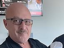 Grandfather charging his Tesla is stabbed by homeless man... then a second STEALS the ambulance that could have saved him, heartbroken family say