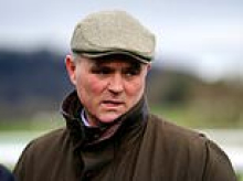 Grand National horse trainer who attacked dogwalker with hockey stick after mistaking him for a poacher is found guilty of causing grievous bodily harm