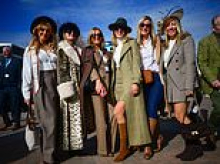 Cheltenham revellers don their finest country chic on the first day of the festival