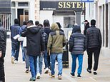 Inside the UK town where women feel under seige from male migrants bussed in from a sprawling camp Starmer said must close TWO YEARS ago