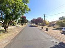 Mystery surrounds the death of a man found alongside a critically injured woman at a rural home - 30-year-old is arrested at a fast food restaurant nearby