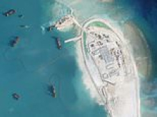China builds the Great Wall of Sand: Xi Jinping orders massive dredger campaign to turn disputed islands into military bases in South China Sea