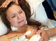 Couple whose new-born baby died after doctors dismissed mother's internal bleeding as 'trapped wind' demand answers