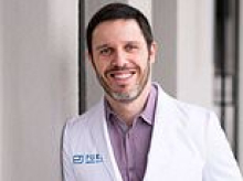 Dentist poses threat to public safety after leaving patient with NECROSIS that could see her lose her front teeth, officials warn